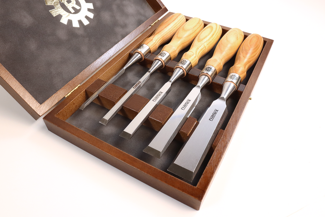 Set of bevel edge chisels in wooden box