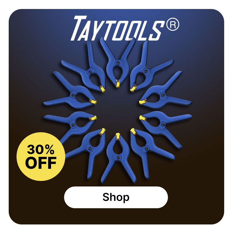 10 Taylor Tool spring clamps on a blue background