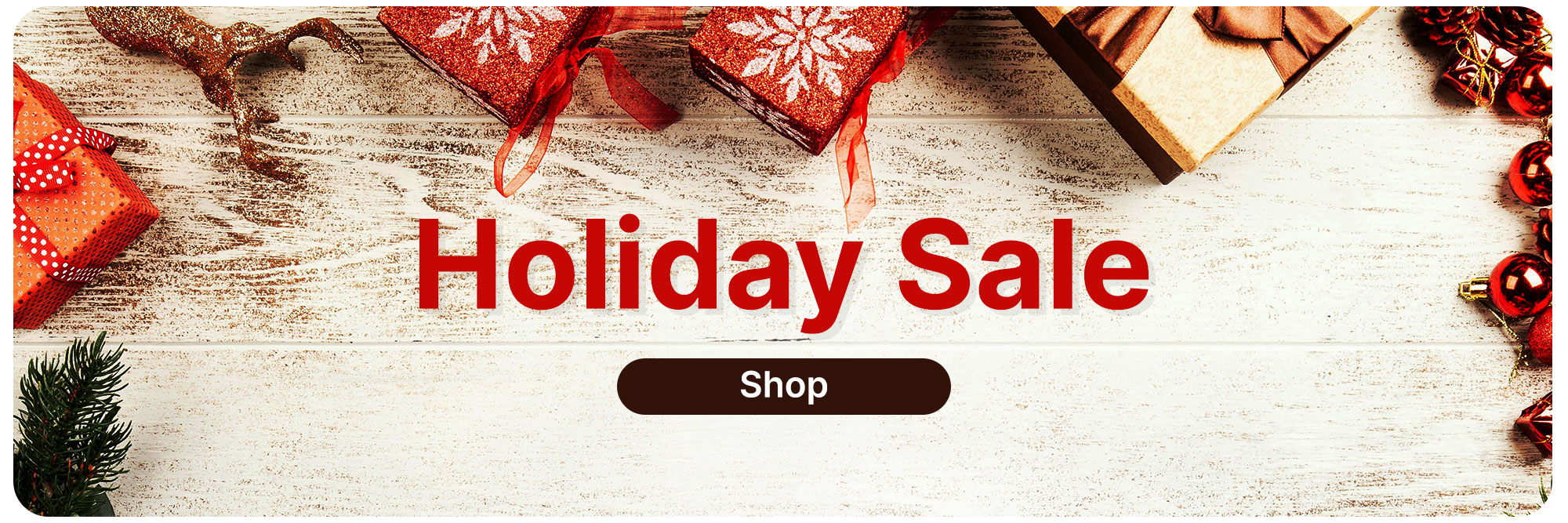 Festive Christmas trinkets on a wooden background.