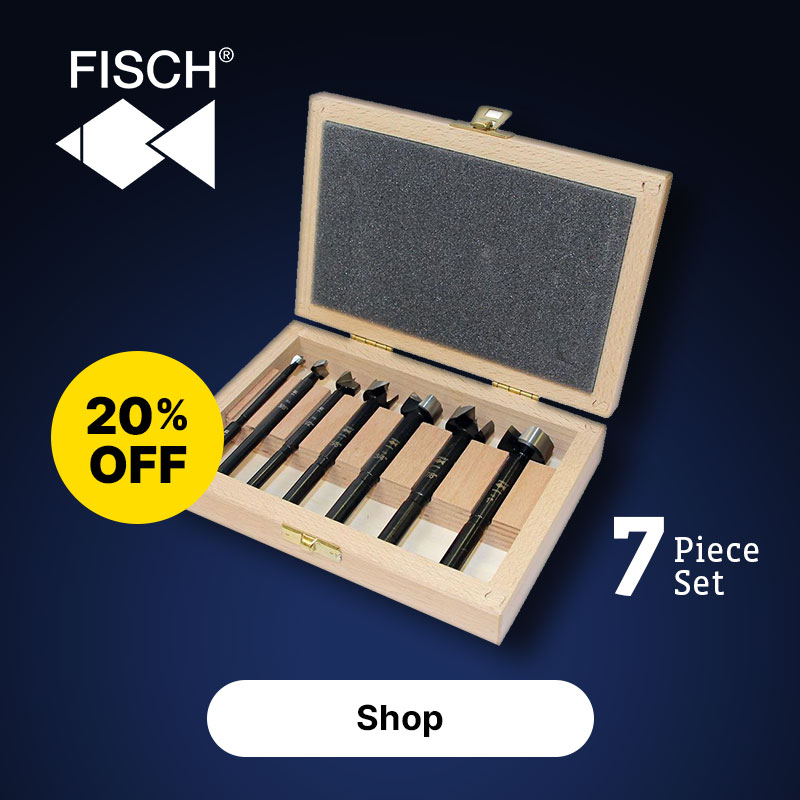 A fostner drill set on a blue background