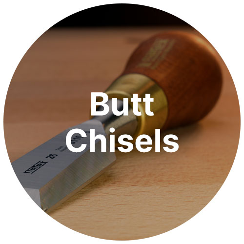 A butt chisel on a wooden work bench