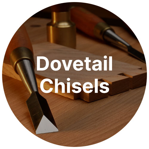 A dovetail chisel on a wooden work bench